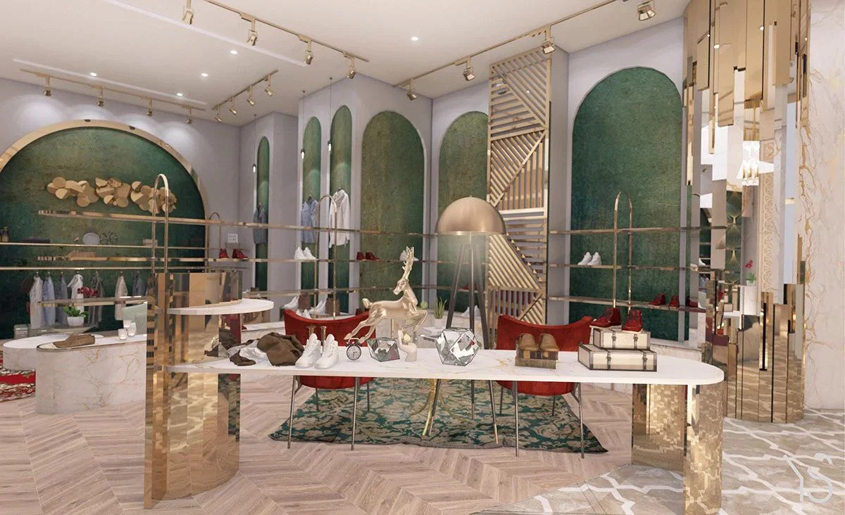 دکوراسیون برند گوچی با میز و دیوارهای طلایی و فرش و دیوار سبز و کفپوش سرامیکی کرم